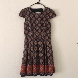 Boho chic fitted boutique dress with open back
